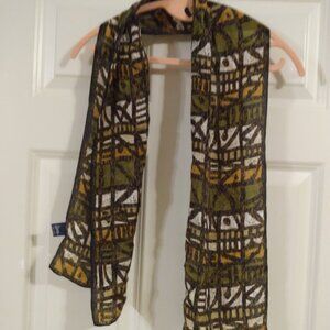 Honey: Multi color silk scarf. Measures approx. 9.5"x52".